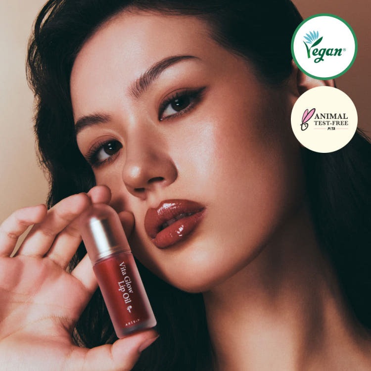 AXIS-Y Vita Glow Lip Oil 4ml Korean skincare product with Vegan lip oil with a glossy, non-sticky finish, Vitamin E and Ceramide NP help nourish and support the lip barrier, Dreamy Olive option offers transparent hydration with olive-derived care